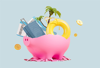 Open piggy bank with a number of travel items spilling out