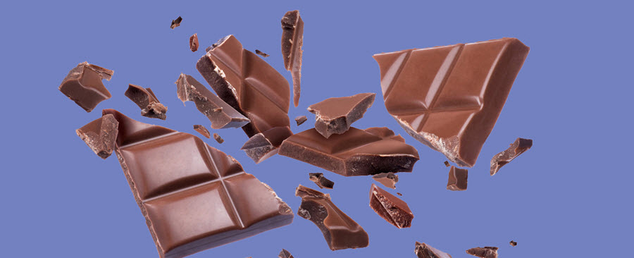 Broken pieces of a chocolate bar.