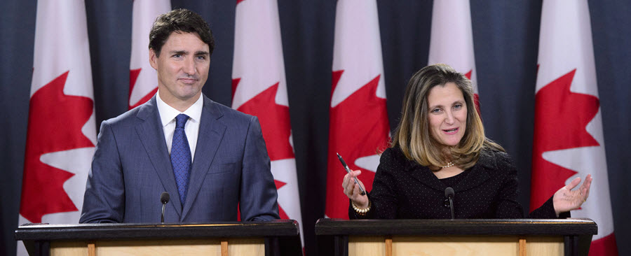 Image of Justin Trudeau and Chrystia Freeland at a press conference.