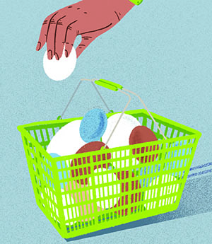 Shopping basket with eggs of different sizes in it. 