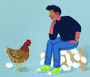 Man sitting on a pile of eggs looking at a rooster. 
