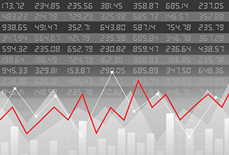 Ticker symbols with graphs running over them. 