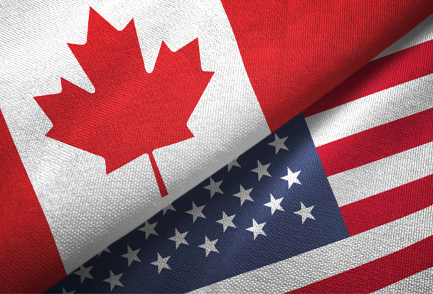 A close-up of the Canadian and United States flag.