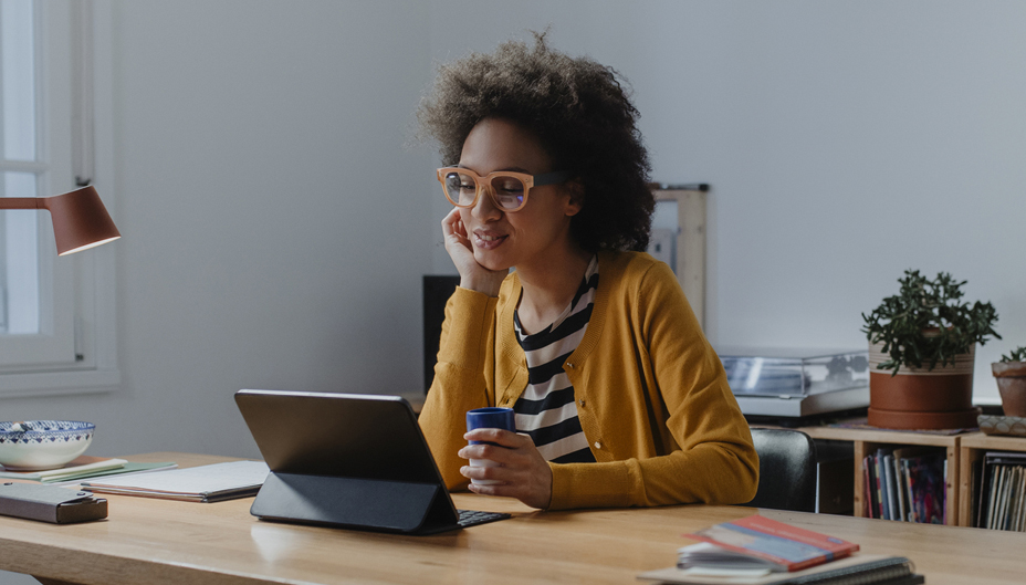 A woman working in her home office.