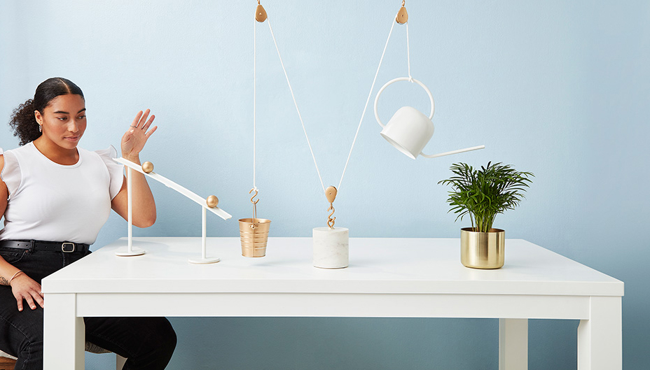 Woman watering plant