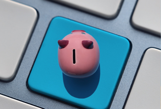 Piggy bank on keyboard