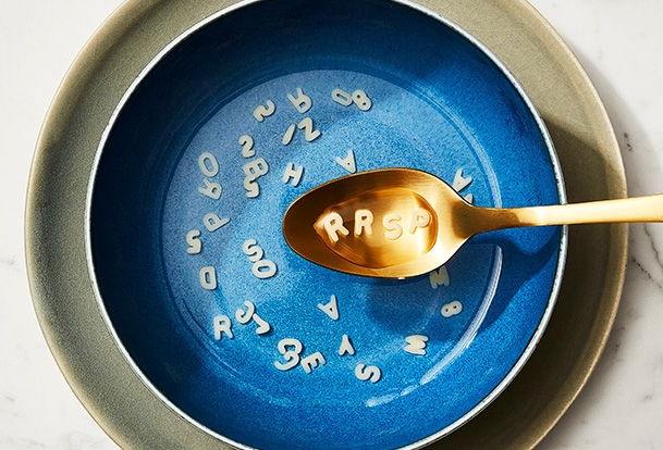 Spoon with the letters RRSP above a bowl of alphabet soup