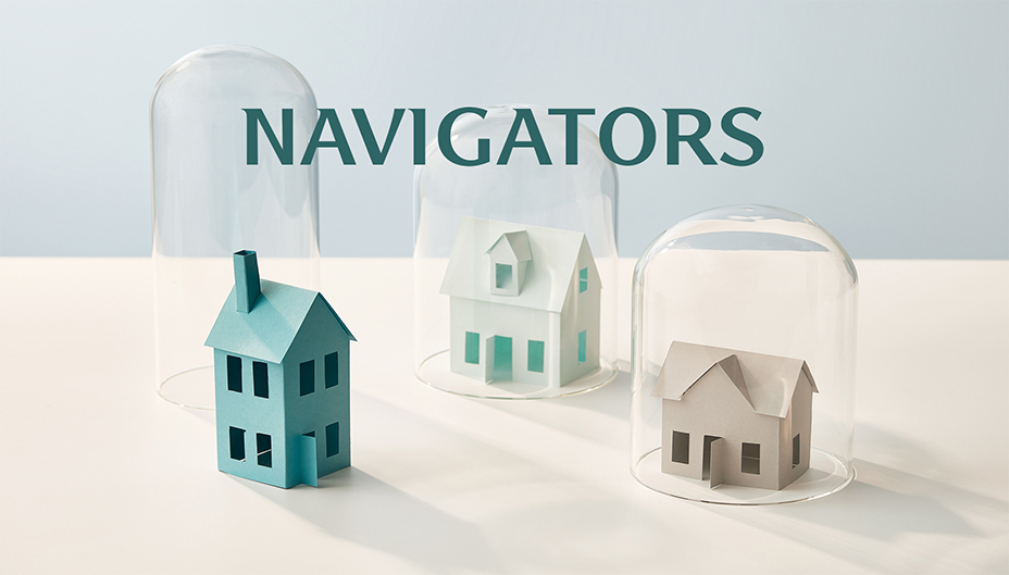 Wooden model homes labelled "Navigators" lead to information about new site features.