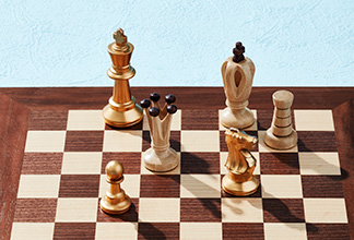 Assorted pieces on a chessboard