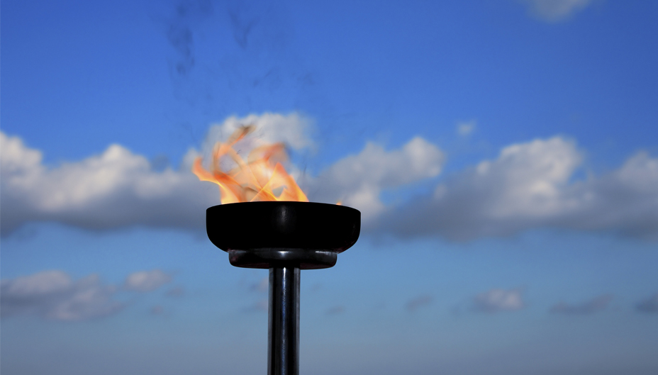 Photograph of a burning torch.